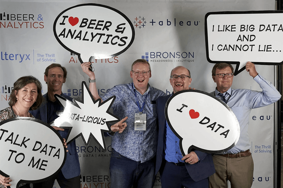 The Bronson team posing and having fun at a Beer & Analytics event.