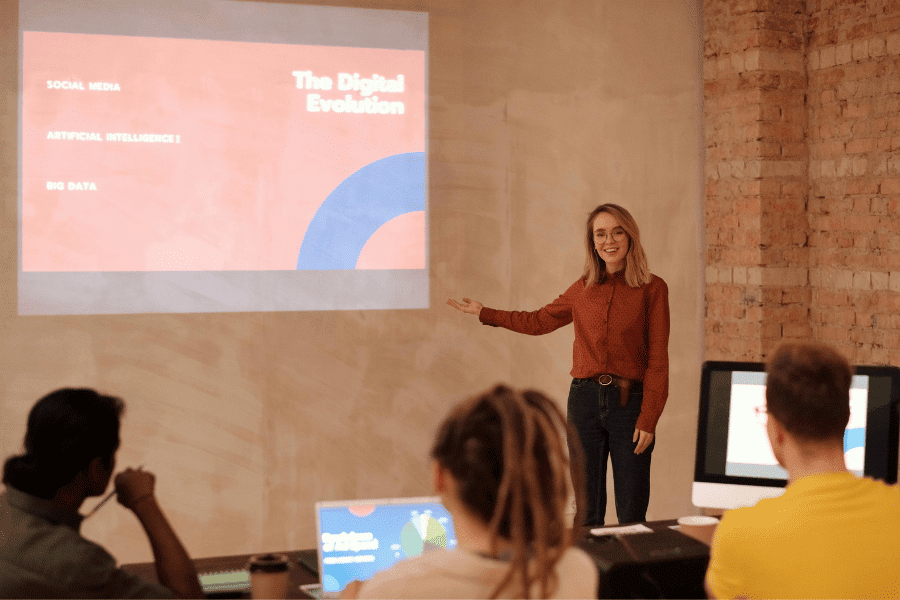 A woman doing a presentation on AI and data