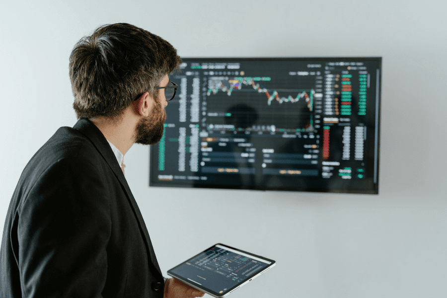 Data analyst reviewing dashboards of datasets